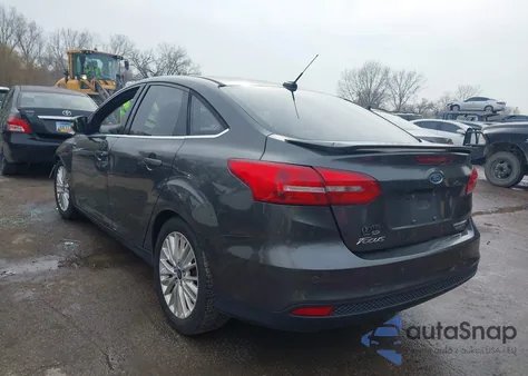 2015 Ford Focus Titanium из США, поврежденный, VIN 1FADP3J28FL293822